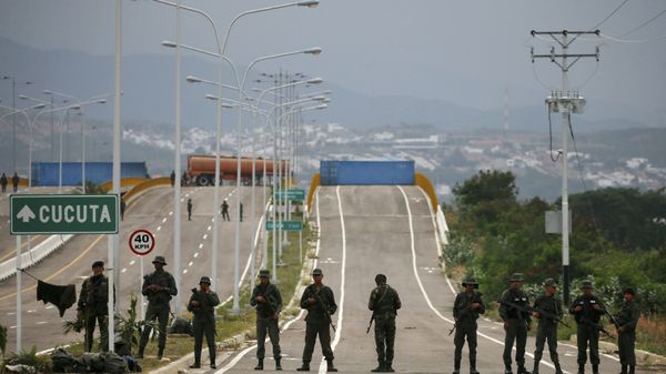 Venezuelan Bolivarian Army soldiers stand guard at the Tienditas International Bridge that links Colombia and Venezuela, near Urena, Venezuela, Friday, Feb. 8, 2019. - Sputnik International