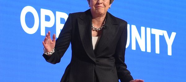 Britain's Prime Minister Theresa May dances a few steps as she takes the stage to give her keynote address on the fourth and final day of the Conservative Party Conference 2018 at the International Convention Centre in Birmingham, central England, on October 3, 2018 - Sputnik International