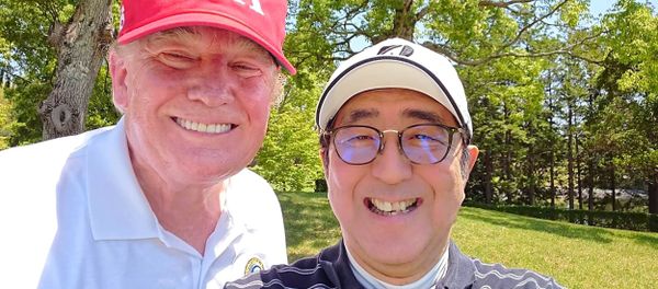 This handout photo taken from the twitter account of The Prime Minister's Office of Japan on May 26, 2019 shows US President Donald Trump (L) and Japan's Prime Minister Shinzo Abe (R) posing for a photograph while playing a round of golf at Mobara Country Club in Chiba.  Handout / The Prime Minister's Office of Japan - Sputnik International