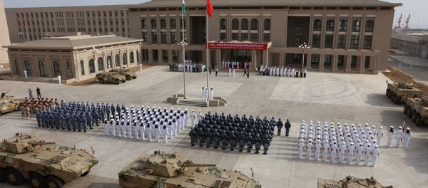 This photo taken on August 1, 2017 shows Chinese People's Liberation Army personnel attending the opening ceremony of China's new military base in Djibouti This photo taken on August 1, 2017 shows Chinese People's Liberation Army personnel attending the opening ceremony of China's new military base in Djibouti - Sputnik International