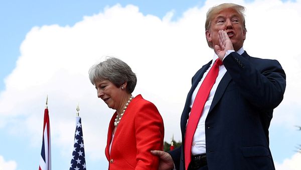 Britain's Prime Minister Theresa May and U.S. President Donald Trump walk after holding a joint news conference at Chequers, the official country residence of the Prime Minister, near Aylesbury, Britain, July 13, 2018 Britain's Prime Minister Theresa May and U.S. President Donald Trump walk after holding a joint news conference at Chequers, the official country residence of the Prime Minister, near Aylesbury, Britain, July 13, 2018 - Sputnik International