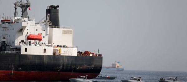 UAE Navy boats are seen next to the Saudi tanker Al Marzoqah off the Port of Fujairah, UAE, May 13, 2019 UAE Navy boats are seen next to the Saudi tanker Al Marzoqah off the Port of Fujairah, UAE, May 13, 2019 - Sputnik International