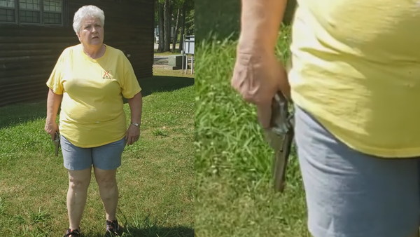 Elderly woman wielding a revolver confronts a couple attempting to have a picnic - Sputnik International