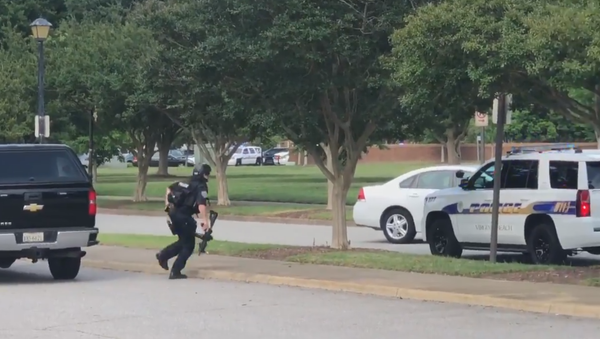 Police Officer responds to reports of a shooting in a Virginia Beach municipal center, May 31, 2019 Police Officer responds to reports of a shooting in a Virginia Beach municipal center, May 31, 2019 - Sputnik International