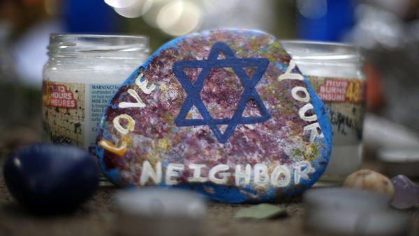 This Wednesday, Oct. 31, 2018, file photo, shows a painted rock found as part of a makeshift memorial outside the Tree of Life Synagogue in the Squirrel Hill neighborhood of Pittsburgh, in honor of the people killed during worship services several days earlier - Sputnik International