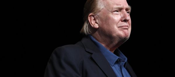 President Donald Trump looks out at the crowd after being prayed for at McLean Bible Church, in Vienna, Va., Sunday June 2, 2019 President Donald Trump looks out at the crowd after being prayed for at McLean Bible Church, in Vienna, Va., Sunday June 2, 2019 - Sputnik International