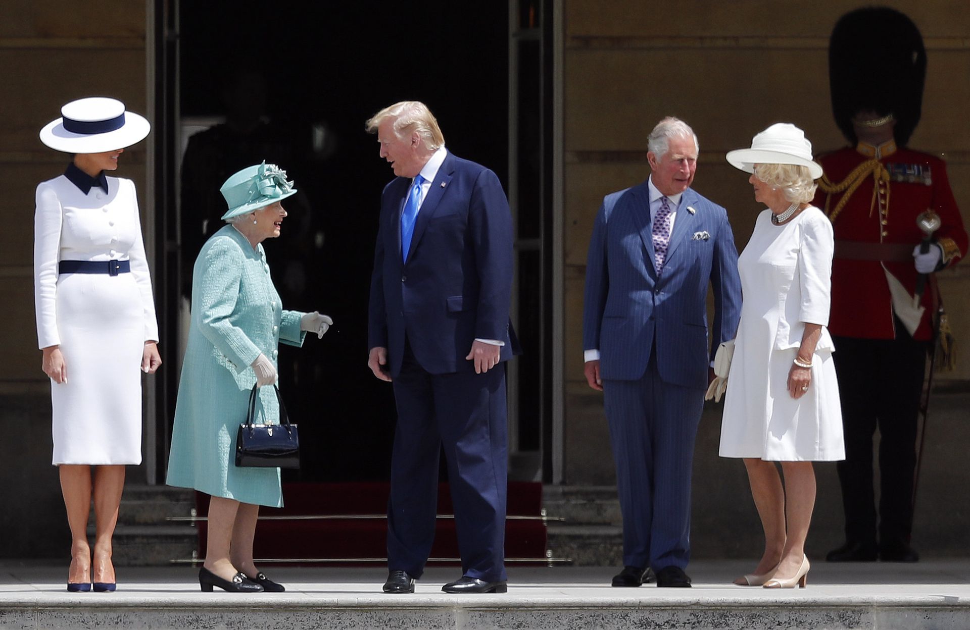 Britain's Queen Elizabeth II greets President Donald Trump, center, and first lady Melania Trump, left, with Britain's Prince Charles and Camilla, Duchess of Cornwall during a ceremonial welcome in the garden of Buckingham Palace in London, Monday, June 3, 2019 on the opening day of a three day state visit to Britain Britain's Queen Elizabeth II greets President Donald Trump, center, and first lady Melania Trump, left, with Britain's Prince Charles and Camilla, Duchess of Cornwall during a ceremonial welcome in the garden of Buckingham Palace in London, Monday, June 3, 2019 on the opening day of a three day state visit to Britain - Sputnik International, 1920, 06.10.2021