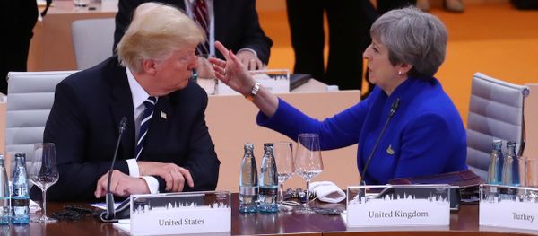 Britain's Prime Minister Theresa May talks with U.S. President Donald Trump during the working session at the G20 leaders summit in Hamburg - Sputnik International
