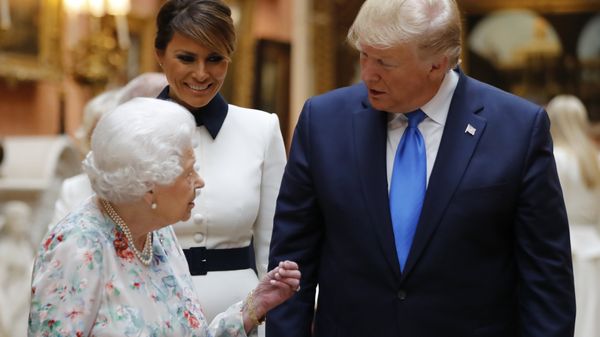 Britain's Queen Elizabeth speaks to U.S President Donald Trump and First Lady Melania Trump as they view U.S memorabilia from the Royal Collection, at Buckingham Palace, London, Monday, June 3, 2019 - Sputnik International