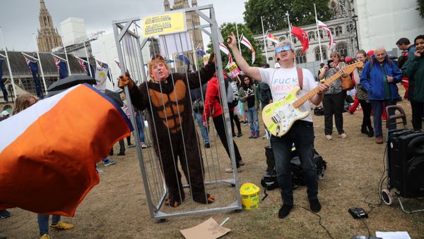 Demonstrators perform as they take part in a protest against U.S. President Donald Trump in London, Britain, June 4, 2019 Demonstrators perform as they take part in a protest against U.S. President Donald Trump in London, Britain, June 4, 2019 - Sputnik International