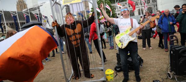 Demonstrators perform as they take part in a protest against U.S. President Donald Trump in London, Britain, June 4, 2019 Demonstrators perform as they take part in a protest against U.S. President Donald Trump in London, Britain, June 4, 2019 - Sputnik International
