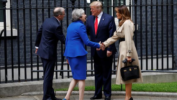 U.S. President Donald Trump and first lady Melania Trump meet Britain's Prime Minister Theresa May and her husband Philip at Downing Street, as part of Trump's state visit in London, Britain, June 4, 2019. U.S. President Donald Trump and first lady Melania Trump meet Britain's Prime Minister Theresa May and her husband Philip at Downing Street, as part of Trump's state visit in London, Britain, June 4, 2019. - Sputnik International