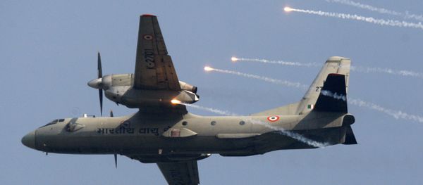 Indian Air Force's (IAF) AN-32 transport aircraft releases flares as it flies past at the IAF Day Parade in New Delhi, India, Thursday, Oct. 8, 2009. The IAF is celebrating its 77th anniversary today - Sputnik International