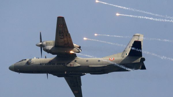Indian Air Force's (IAF) AN-32 transport aircraft releases flares as it flies past at the IAF Day Parade in New Delhi, India, Thursday, Oct. 8, 2009. The IAF is celebrating its 77th anniversary today - Sputnik International