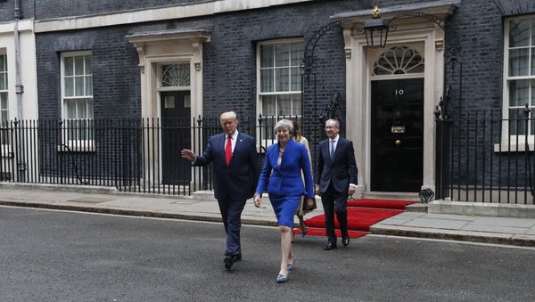 Britain's Prime Minister Theresa May, her husband Philip May, right, President Donald Trump and first lady Melania Trump, second right, walk from 10 Downing Street to the Foreign Office for a joint press conference in central London, Tuesday, June 4, 2019 Britain's Prime Minister Theresa May, her husband Philip May, right, President Donald Trump and first lady Melania Trump, second right, walk from 10 Downing Street to the Foreign Office for a joint press conference in central London, Tuesday, June 4, 2019 - Sputnik International