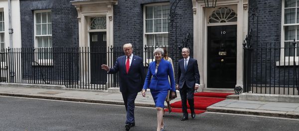 Britain's Prime Minister Theresa May, her husband Philip May, right, President Donald Trump and first lady Melania Trump, second right, walk from 10 Downing Street to the Foreign Office for a joint press conference in central London, Tuesday, June 4, 2019 Britain's Prime Minister Theresa May, her husband Philip May, right, President Donald Trump and first lady Melania Trump, second right, walk from 10 Downing Street to the Foreign Office for a joint press conference in central London, Tuesday, June 4, 2019 - Sputnik International