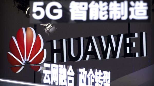 In this Sept. 26, 2018, photo, signs promoting 5G wireless technology from Chinese technology firm Huawei are displayed at the PT Expo in Beijing. A spy chief said in a speech released Tuesday, Oct. 30, 2018 - Sputnik International