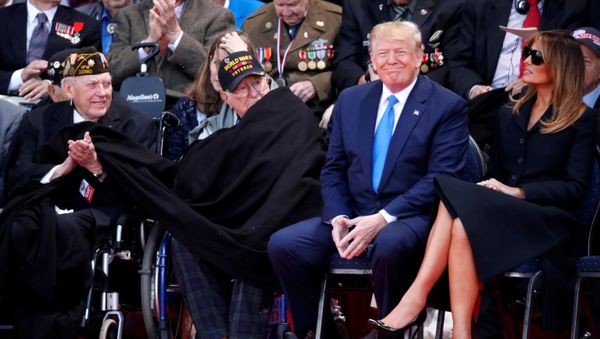 U.S President Donald Trump and First Lady Melania Trump sit next to WWII veterans during a ceremony to mark the 75th anniversary of the D-Day at the Normandy American Cemetery and Memorial in Colleville-sur-Mer, France, June 6, 2019 - Sputnik International