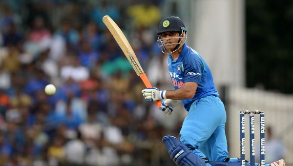 Indian cricketer Mahendra Singh Dhoni plays a shot during the first one day international (ODI) cricket match in the India-Australia series at the M A Chidhambaram stadium in Chennai on September 17, 2017 - Sputnik International