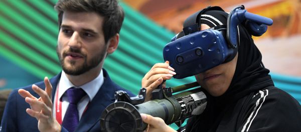 SPIEF 2019 visitor in the HTC Vive VR headset SPIEF 2019 visitor in the HTC Vive VR headset - Sputnik International