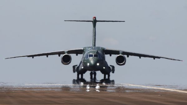 The new militar transport and  refueling aircraft KC-390 of the Embraer Brasilian aviation company is seen at the inauguration flight on Gaviao Peixoto, Sao Paulo, Brasil - Sputnik International