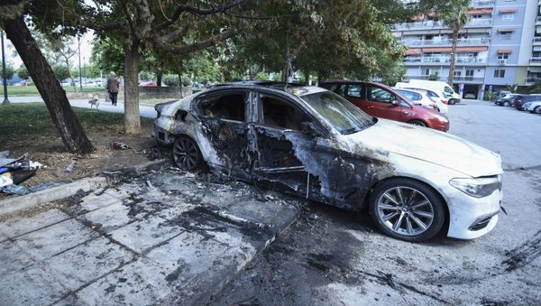 A damaged car belonging to a Turkish national is parked by a block of flats in the northern port city of Thessaloniki, Greece on Monday, June 10, 2019 A damaged car belonging to a Turkish national is parked by a block of flats in the northern port city of Thessaloniki, Greece on Monday, June 10, 2019 - Sputnik International