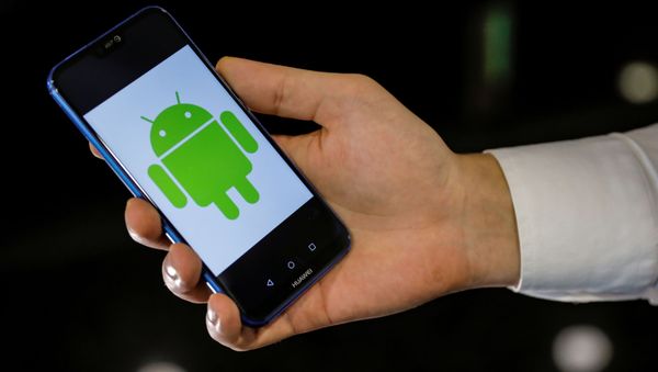 An Android logo is displayed on a Huawei smartphone in this illustration picture May 20, 2019 - Sputnik International