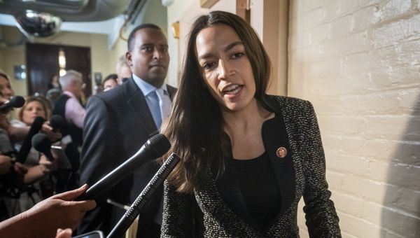Rep. Alexandria Ocasio-Cortez, D-N.Y., followed by Rep. Joe Neguse, D-Colo., responds to reporters' questions after Speaker of the House Nancy Pelosi, D-Calif., met with all the House Democrats, many calling for impeachment proceedings against President Donald Trump after his latest defiance of Congress by blocking his former White House lawyer from testifying yesterday, at the Capitol in Washington, Wednesday, May 22, 2019 - Sputnik International