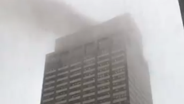 Screenshot of fire following helicopter crash in Manhattan. - Sputnik International