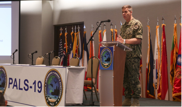 Admiral Phil Davidson makes a speech on June 4 with the flag of Taiwan’s Marines Corps in the background  - Sputnik International