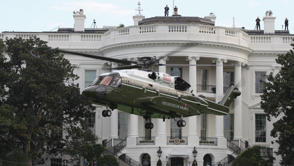 WASHINGTON (Sept. 22, 2018) Marine Helicopter Squadron (HMX) 1 conducts test flights of the new VH-92A helicopter over the South Lawn of the White House, Sept. 22, 2018, in Washington, D.C. - Sputnik International