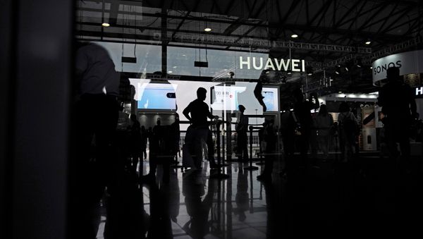 A Huawei company logo is seen at CES (Consumer Electronics Show) Asia 2019 in Shanghai, China June 11, 2019 - Sputnik International