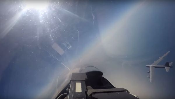 Video of USAF B-52 being intercepted by Russian Su-27 fighter. Video of USAF B-52 being intercepted by Russian Su-27 fighter. - Sputnik International