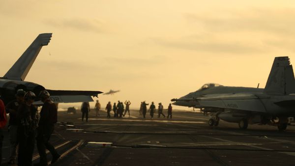 US Navy sailors launch an F/A-18 Super Hornet from the flight deck of the aircraft carrier USS Abraham Lincoln in the Arabian Sea, 3 June 2019 US Navy sailors launch an F/A-18 Super Hornet from the flight deck of the aircraft carrier USS Abraham Lincoln in the Arabian Sea, 3 June 2019 - Sputnik International