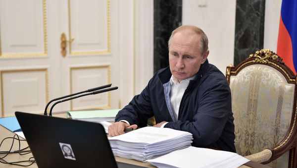 Russian President Vladimir Putin chairs a meeting ahead of his annual question and answer session which is to take place on June 20, in Moscow, Russia Russian President Vladimir Putin chairs a meeting ahead of his annual question and answer session which is to take place on June 20, in Moscow, Russia - Sputnik International