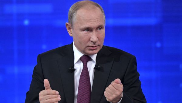 Russian President Vladimir Putin reacts during his annual live broadcast call-in show with the nation in Moscow, Russia - Sputnik International