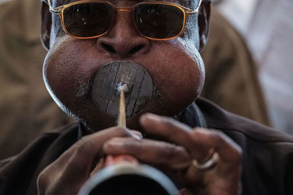 A Sudanese Man Plays a Local Musical Instrument Ahead of a Meeting with Mohamed Hamdan Dagalo A Sudanese Man Plays a Local Musical Instrument Ahead of a Meeting with Mohamed Hamdan Dagalo - Sputnik International