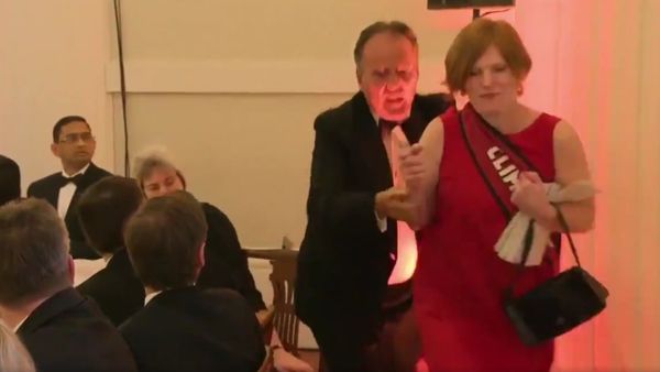 Footage shows foreign office minister Mark Field MP removing a protestor from the Mansion House dinner earlier this evening - Sputnik International