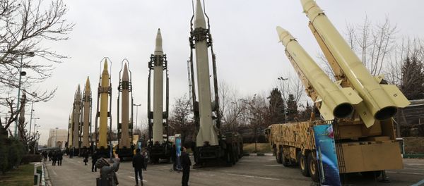 Iranians visit a weaponry and military equipment exhibition in the capital Tehran on Febraury 2, 2019, organised on the occasion of the 40th anniversary of the Isranian revolution Iranians visit a weaponry and military equipment exhibition in the capital Tehran on Febraury 2, 2019, organised on the occasion of the 40th anniversary of the Isranian revolution - Sputnik International