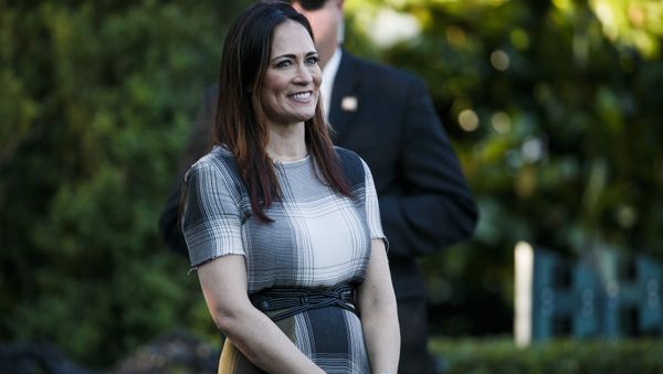 Stephanie Grisham, spokeswoman for first lady Melania Trump, watches as President Donald Trump and the first lady greet attendees during the annual Congressional Picnic on the South Lawn, Friday, June 21, 2019, in Washington. Stephanie Grisham, spokeswoman for first lady Melania Trump, watches as President Donald Trump and the first lady greet attendees during the annual Congressional Picnic on the South Lawn, Friday, June 21, 2019, in Washington. - Sputnik International