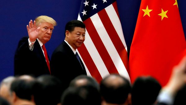 U.S. President Donald Trump and China's President Xi Jinping meet business leaders at the Great Hall of the People in Beijing, China, November 9, 2017 - Sputnik International