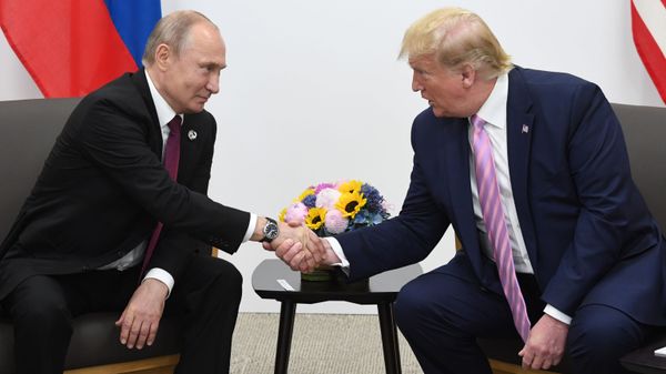 Russian President Vladimir Putin and U.S. President Donald Trump shake hands during a bilateral meeting at the at the Group of 20 (G20) leaders summit in Osaka, Japan. Russian President Vladimir Putin and U.S. President Donald Trump shake hands during a bilateral meeting at the at the Group of 20 (G20) leaders summit in Osaka, Japan. - Sputnik International