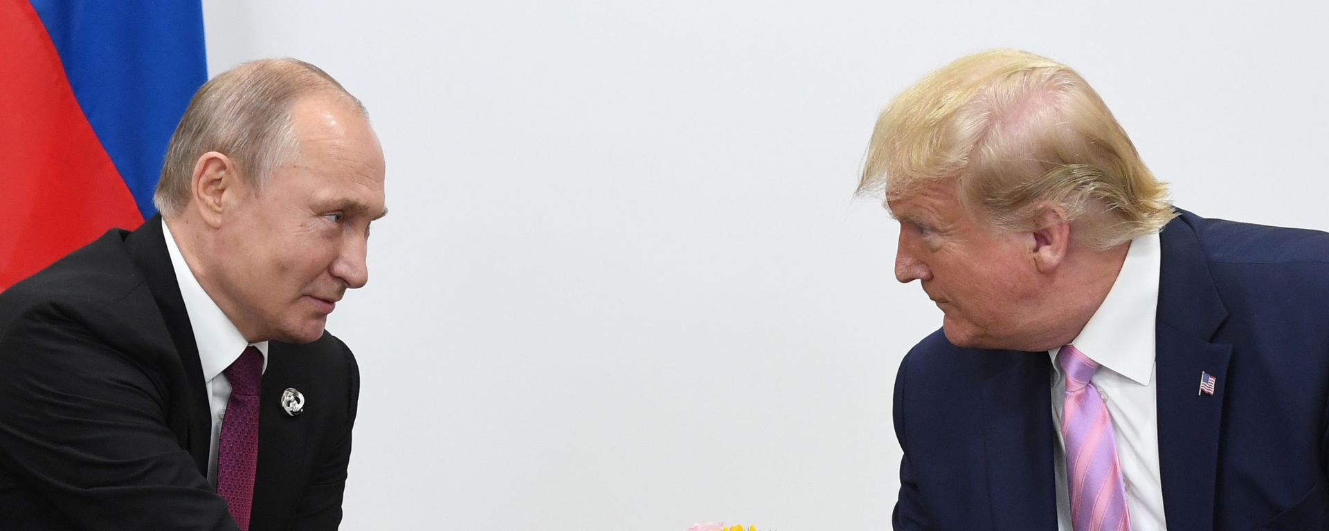 Russian President Vladimir Putin and U.S. President Donald Trump shake hands during a bilateral meeting at the at the Group of 20 (G20) leaders summit in Osaka, Japan. - Sputnik International, 1920, 30.04.2025