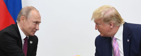 Russian President Vladimir Putin and U.S. President Donald Trump shake hands during a bilateral meeting at the at the Group of 20 (G20) leaders summit in Osaka, Japan. - Sputnik International