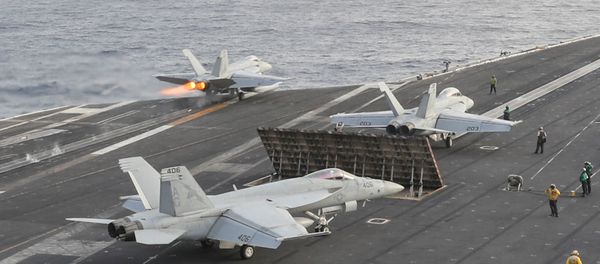 An F/A-18E Super Hornet launches from the flight deck of the Nimitz-class aircraft carrier USS Abraham Lincoln, in Arabian Sea, June 22, 2019 An F/A-18E Super Hornet launches from the flight deck of the Nimitz-class aircraft carrier USS Abraham Lincoln, in Arabian Sea, June 22, 2019 - Sputnik International