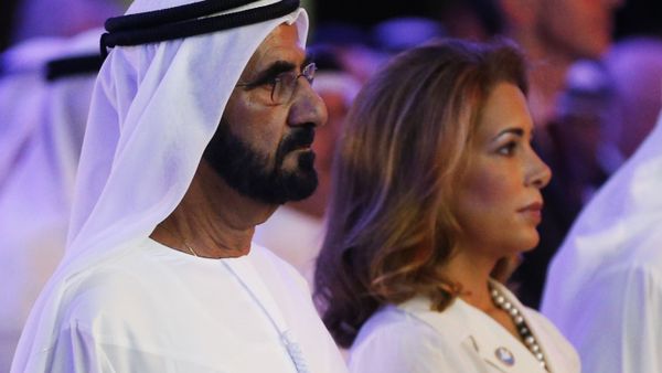 UAE Prime Minister and Dubai Ruler Sheikh Mohammed bin Rashid al-Maktoum (L) stands next to his wife Princess Haya bint al-Hussein during the presentation of a UN report on funding for humanitarian aid on January 17, 2016, in the Emirate of Dubai.  - Sputnik International