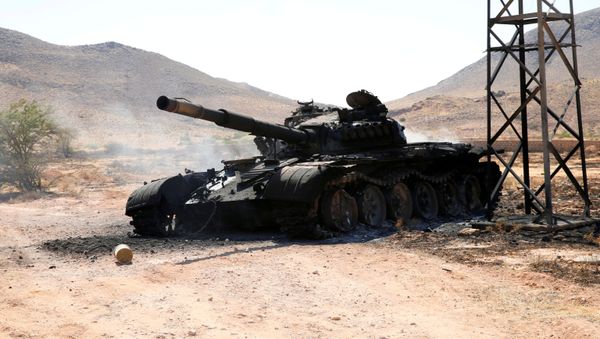 A destroyed and burnt tank, that belongs to the eastern forces led by Khalifa Haftar, is seen in Gharyan south of Tripoli Libya June 27, 2019.  - Sputnik International