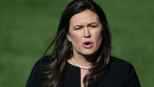 U.S. White House Press Secretary Sarah Huckabee Sanders speaks to the news media after giving an interview to Fox News outside of the White House in Washington, U.S. June 11, 2019 - Sputnik International