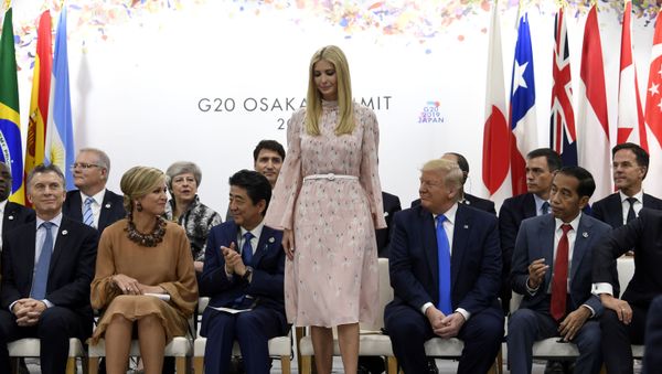 Ivanka Trump stands up to speak at the President G-20 summit event on women's empowerment in Osaka, Japan, in Osaka, Japan, Saturday, June 29, 2019. President Donald Trump, center right, also attends.  - Sputnik International