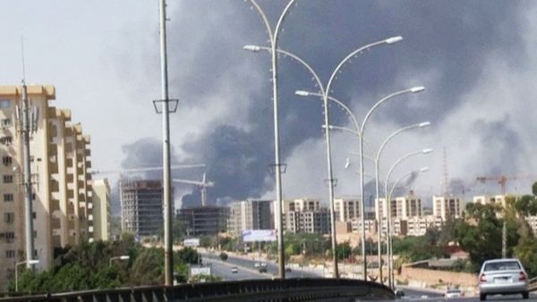 July 13, 2014 file image made from video by The Associated Press, smoke rises from the direction of Tripoli airport in Tripoli, Libya. - Sputnik International